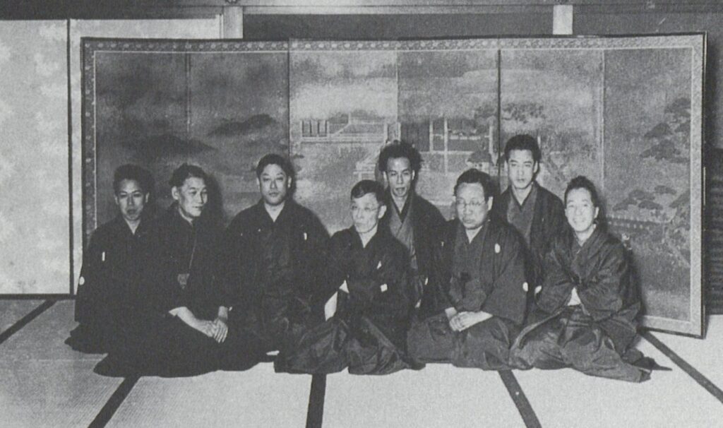 Akutagawa (centre back) at a publication party for his friend Izumi Kyoka.