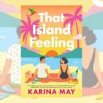 The cover for That Island Feeling by Karina May is a pink and yellow sunset colour theme, featuring a cartoon image of a couple in bathers on the beach enjoying a picnic